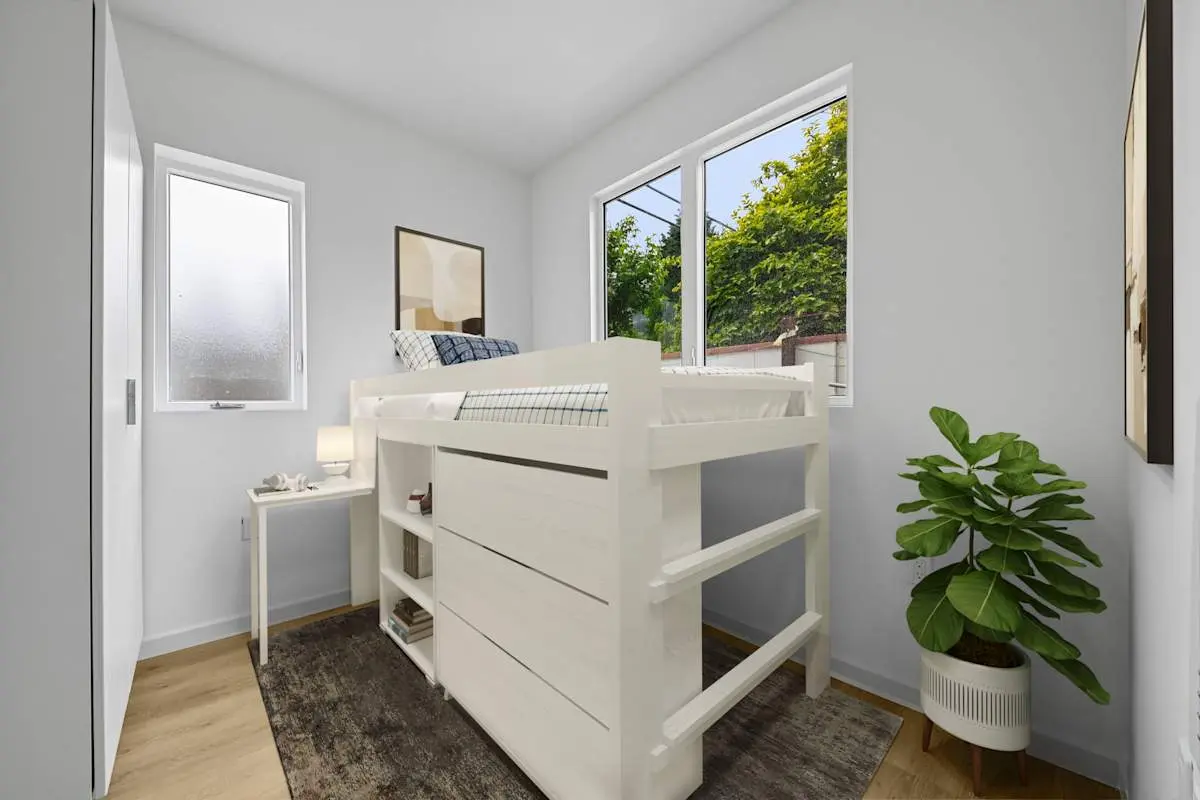 Bedroom with lofted bed and window light