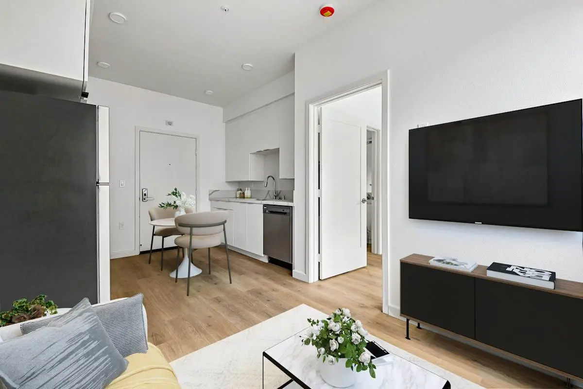 Open kitchen and dining area with table and chairs