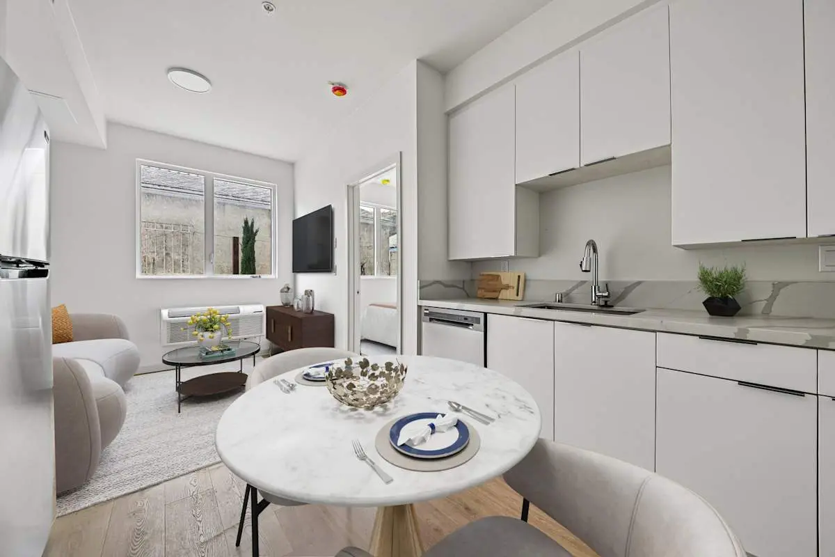 Modern kitchen with dining table set for two